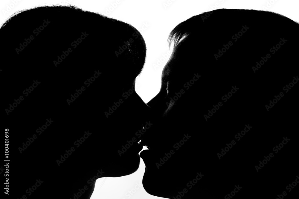 Black and white silhouettes of couples in love