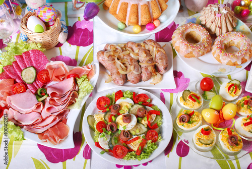 Canvas Print traditional easter breakfast on festive table