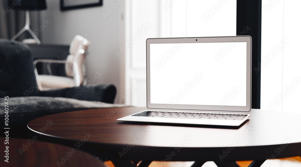 Concept of generic design laptop on the table in modern interior at background. Focus computer. 3d render Concept of generic design laptop on the table in modern interior at background. Focus computer. 3d render