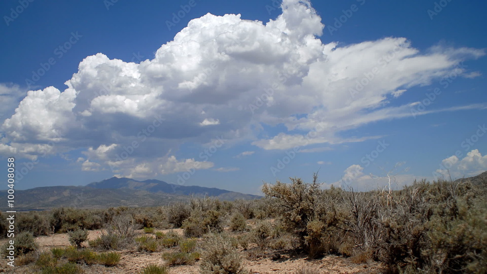 Time-lapse of grassy plain and clouds. Time-lapse of grassy plain and clouds.