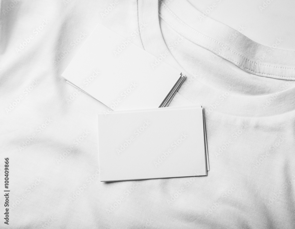 Closeup of blanks business cards on white tshirt Closeup of blanks business cards on white tshirt