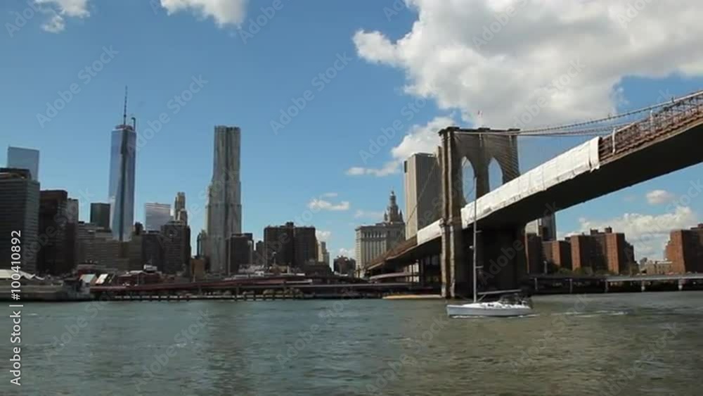 View of New York City while floating the East River at the Brooklyn Bridge. View of New York City while floating the East River at the Brooklyn Bridge.
