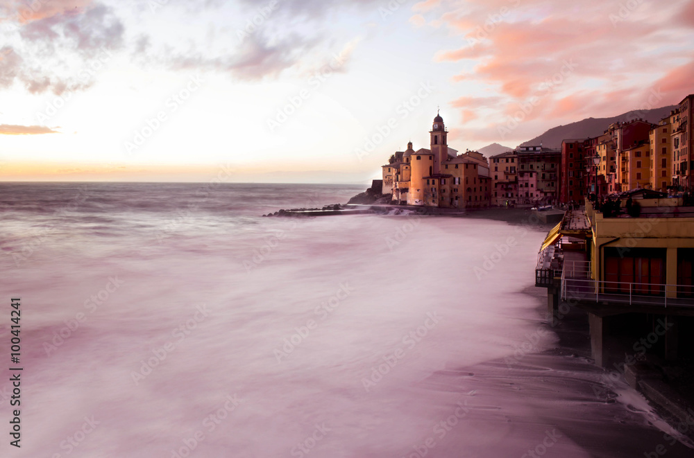 camogli seafront at sunset with rough sea