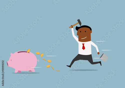 Fast businessman trying to smash a piggy bank
