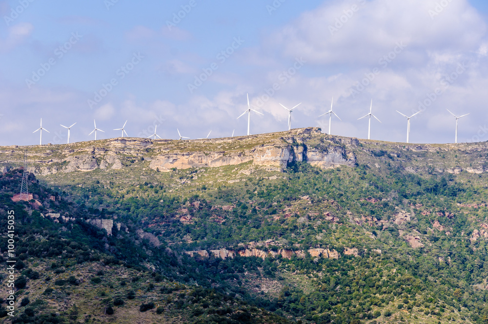 View of windmills from Escornibau Monastery in Spain
