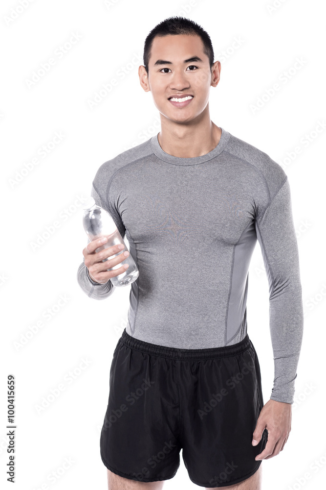 Fitness man posing with water bottle Fitness man posing with water bottle