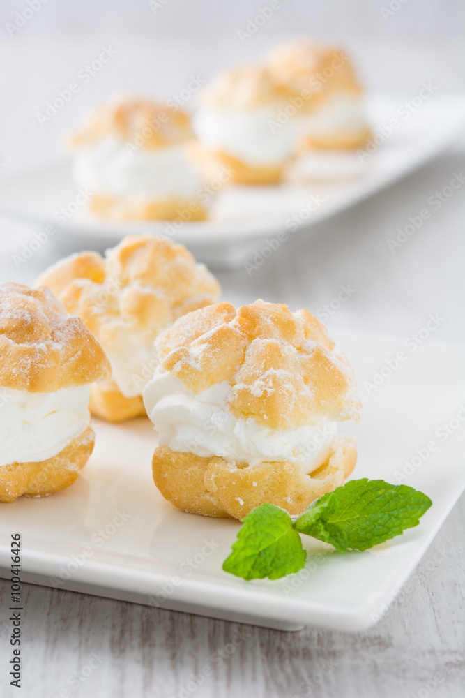 Fresh profiteroles with cream
