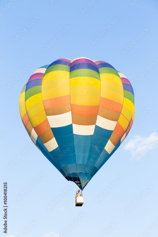 Fototapeta premium Colorful hot air balloon with blue sky background