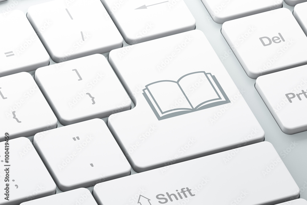 Learning concept: Book on computer keyboard background Learning concept: Book on computer keyboard background