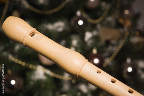 white recorder near a New Year tree photo