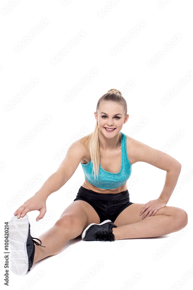 Pretty lady doing stretching exercise Pretty lady doing stretching exercise