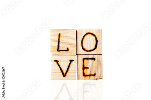Romantic inscription of letters on light wooden cubes isolated o