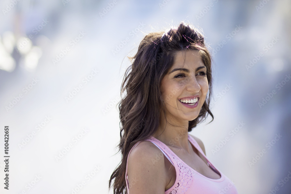 Portrait of a smilling beautiful brunette woman outdoor Portrait of a smilling beautiful brunette woman outdoor
