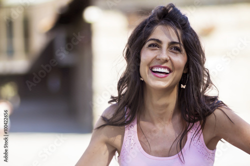 Portrait of a smilling beautiful brunette woman outdoor Free Download Portrait of a smilling beautiful brunette woman outdoor - GFXLoad