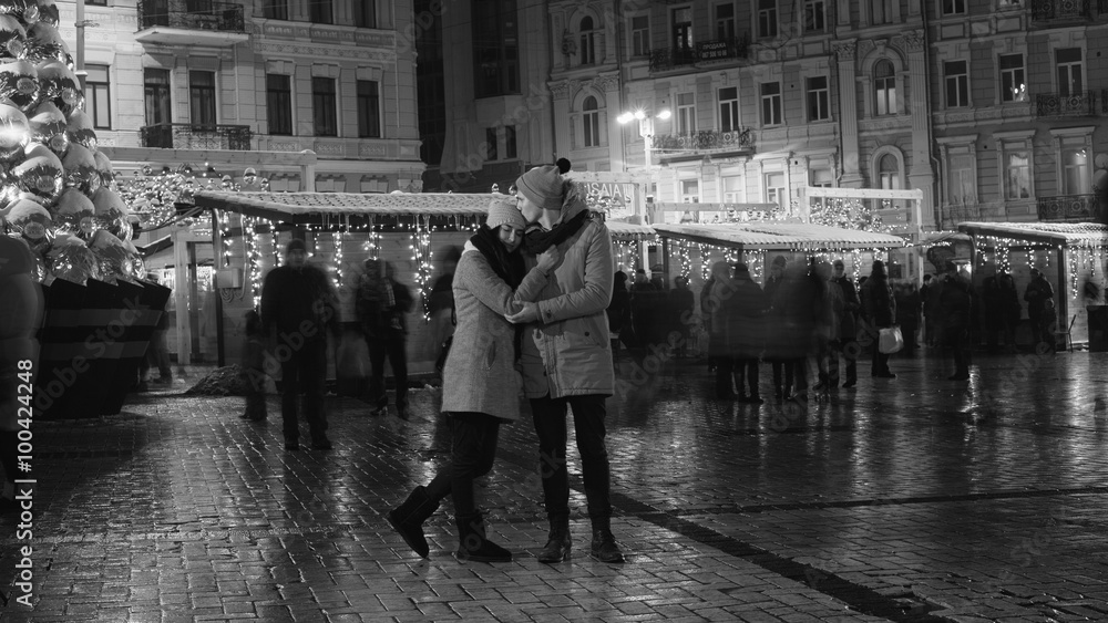 Young couple have date in city square