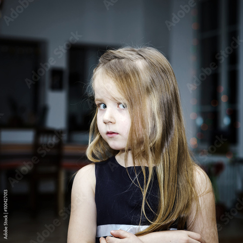 Cute little girl posing indoor