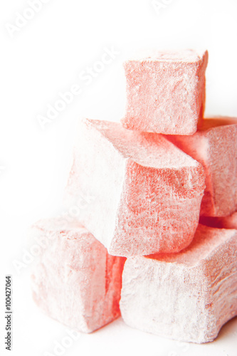 Pink Turkish delight on the white background vertical