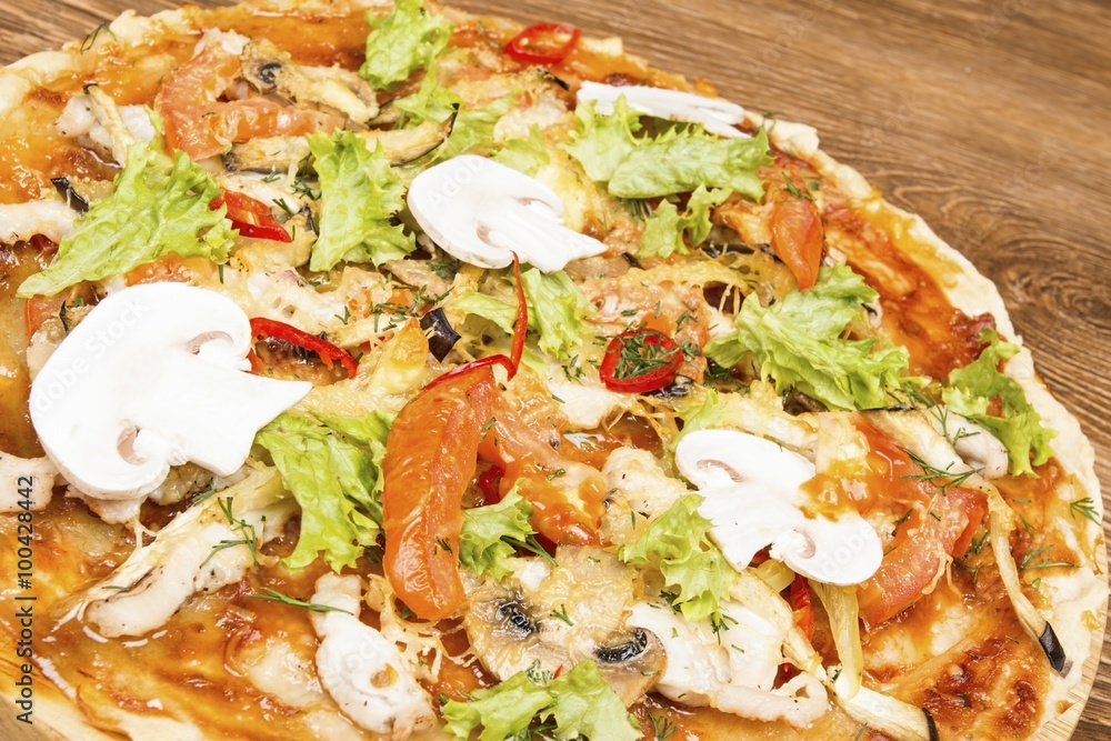 Pizza on dark wooden background. Stock image macro. Pizza on dark wooden background. Stock image macro.