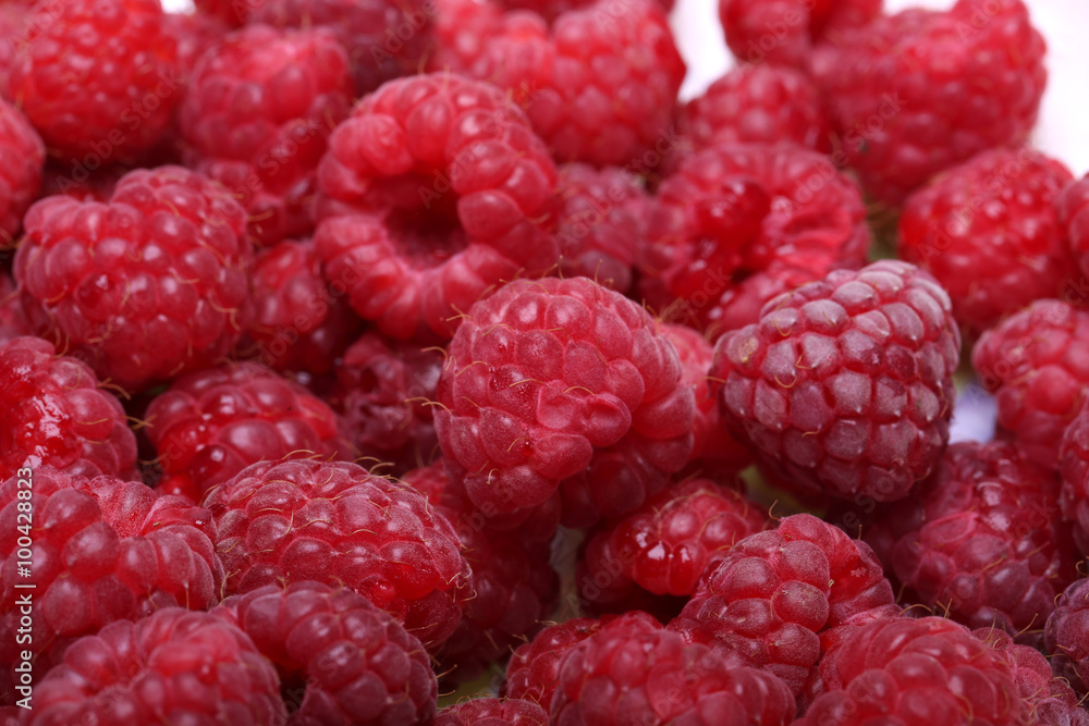 A beautiful selection of freshly picked ripe red raspberries. A beautiful selection of freshly picked ripe red raspberries.