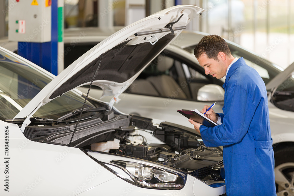 Small businessman working in repair shop Small businessman working in repair shop