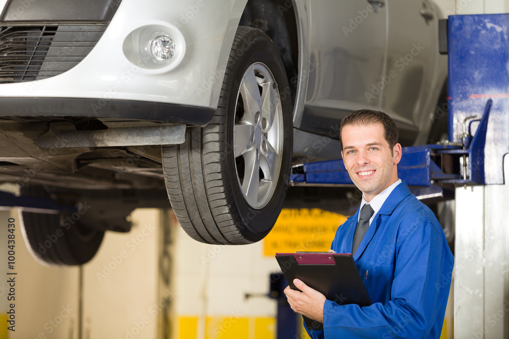 Small businessman working in repair shop Small businessman working in repair shop