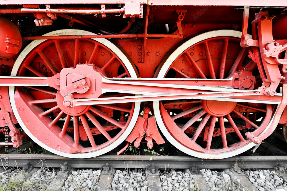 Old steam train driving wheels