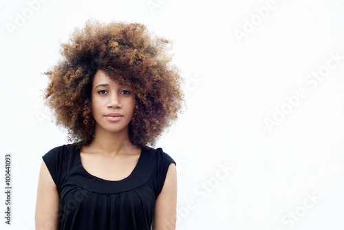 Young african woman with curly hair