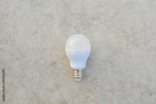 LED Bulb on the white concrete