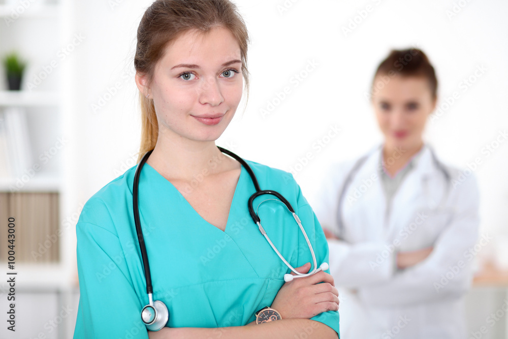 Portrait of young female surgeon doctor in a hospital Portrait of young female surgeon doctor in a hospital