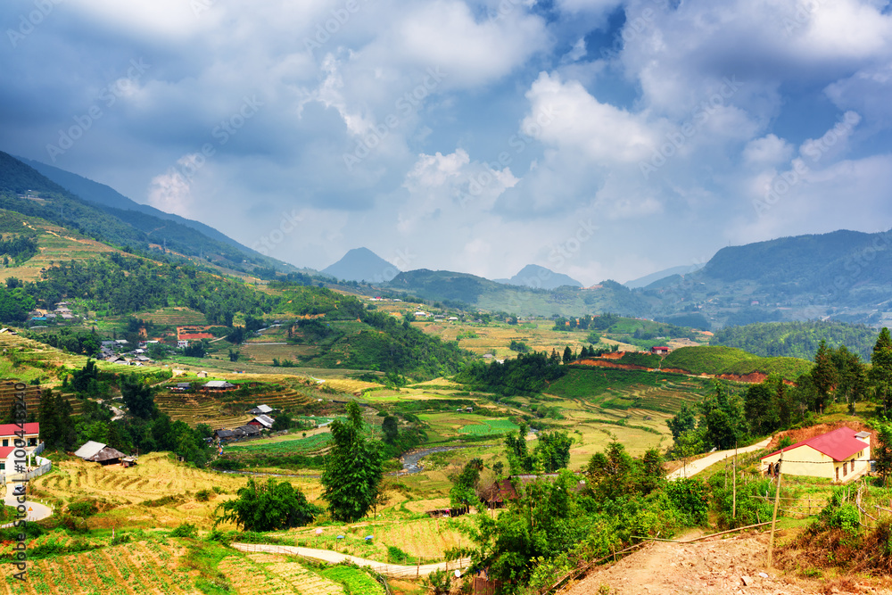View of village and rice terraces at highlands. Sa Pa, Vietnam