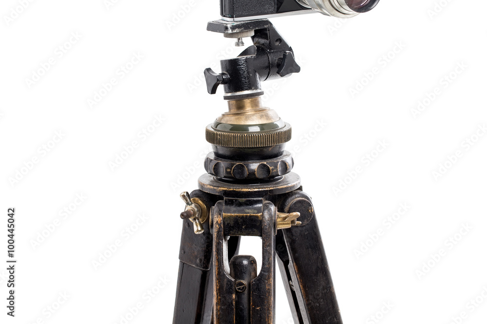 Closeup of old wooden tripod.
