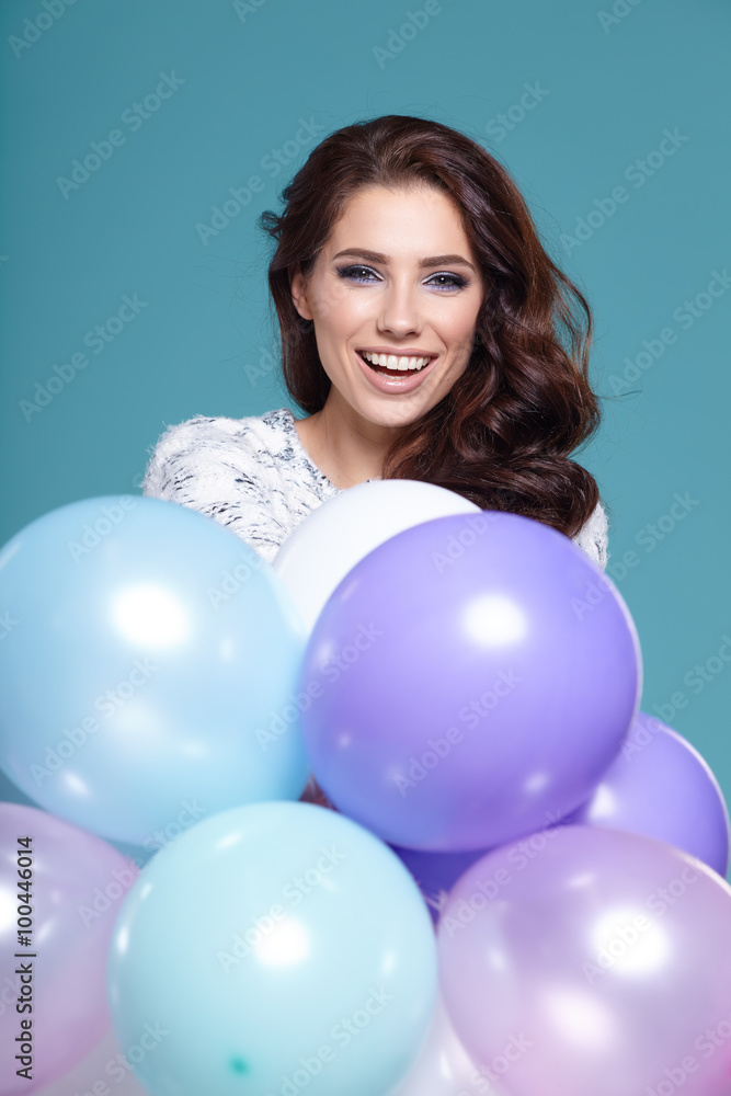 Happy young woman with colorful latex balloons, Happy young woman with colorful latex balloons,