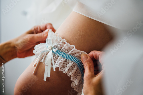 Gorgeous stylish happy elegant bride getting prepared 