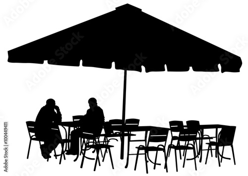 Silhouettes of people in urban cafe