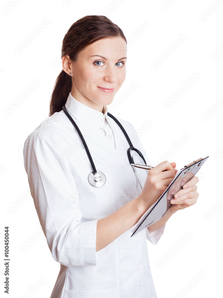 Beautiful nurse smiling and taking notes Beautiful nurse smiling and taking notes
