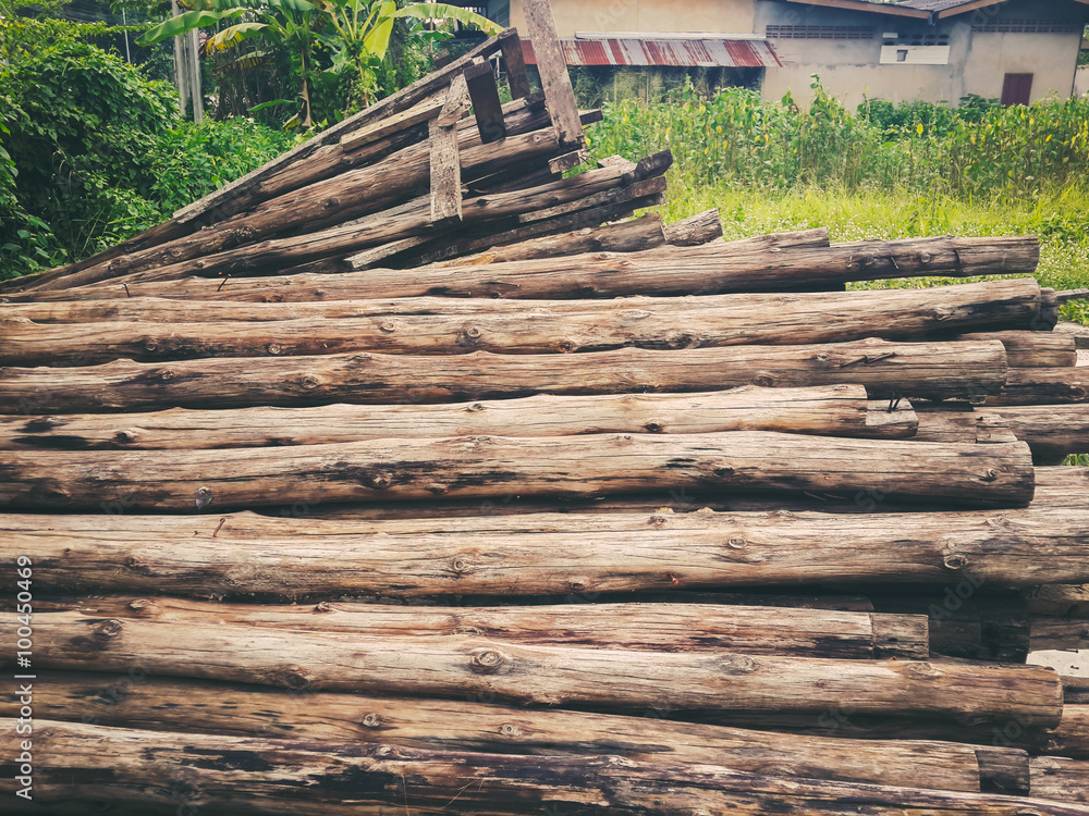 Seamlessly tiling wooden log wall background. Seamlessly tiling wooden log wall background.