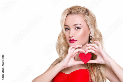 ove and valentines day woman holding heart smiling cute. Portrait of Beautiful woman with bright makeup and red heart in hand 