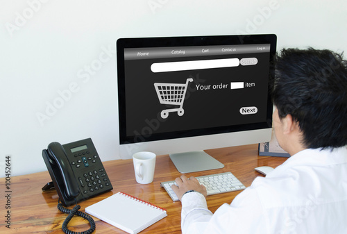 Businessman Using Computer Online Shopping Application