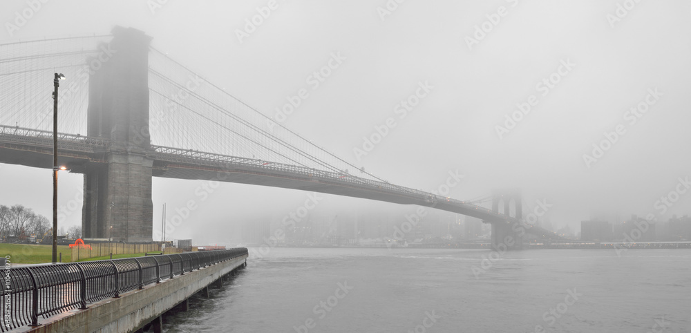 Brooklyn Bridge in a fog.