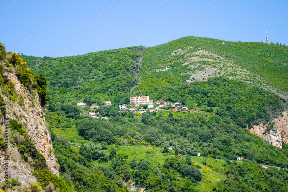 Fototapeta premium MONTENEGRO - JUNE 2016. Construction of the building on the top of the mountain