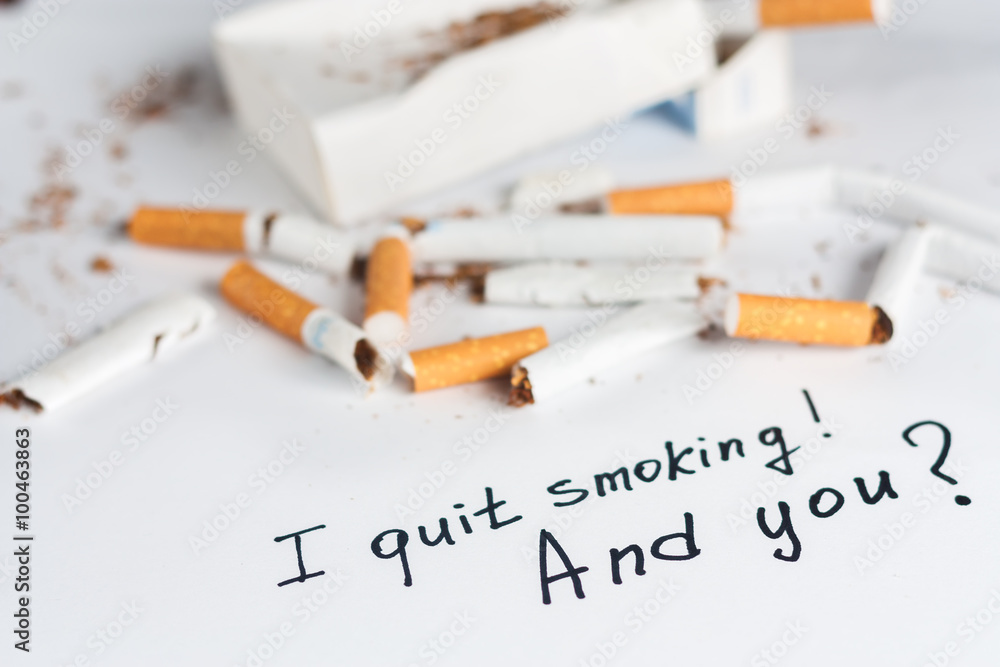 Antismoking background with broken cigarettes
