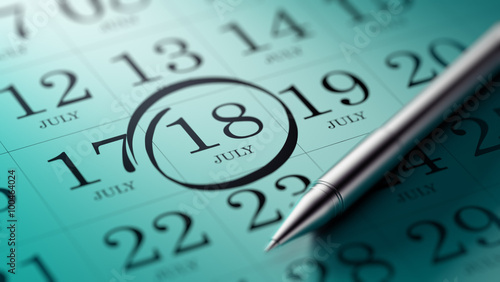 Photos July 18 written on a calendar to remind you an important appoint