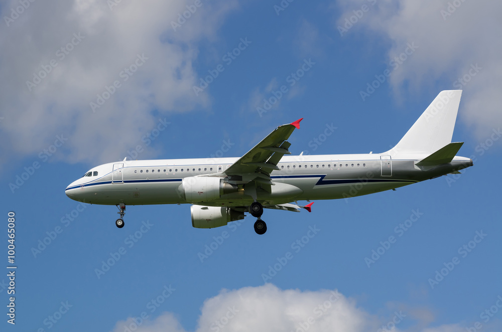 Passenger jet airplane in the sky with gear down Passenger jet airplane in the sky with gear down