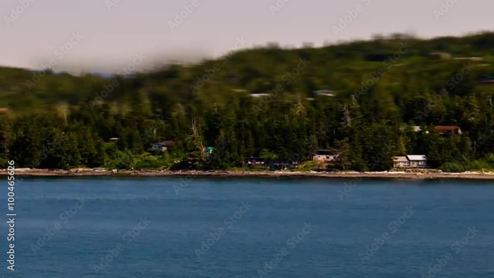 Time-lapse view of houses along the shoreline of the Inside Passage of Alaska. Time-lapse view of houses along the shoreline of the Inside Passage of Alaska.