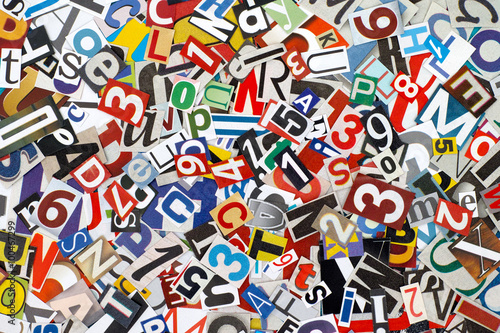 Heap of cutout letters and numbers from newspapers and magazines
