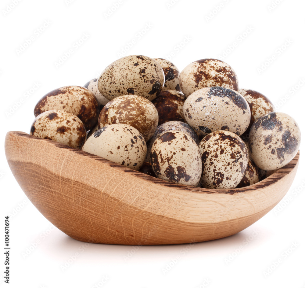quail eggs in wooden bowl isolated on white background cutout quail eggs in wooden bowl isolated on white background cutout