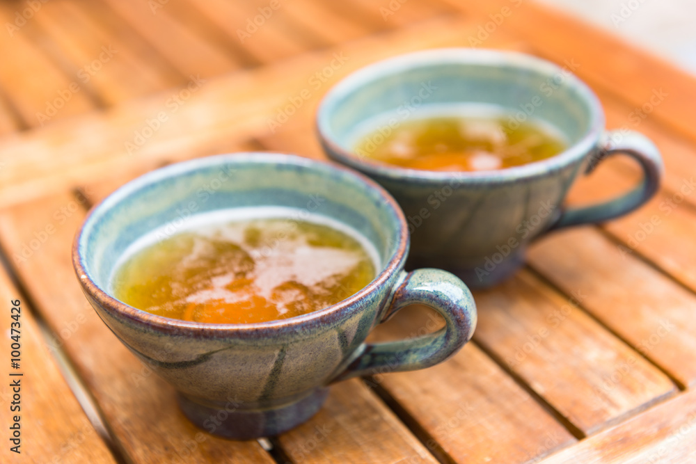 Norman apple cider in a typical ceramic cups Norman apple cider in a typical ceramic cups