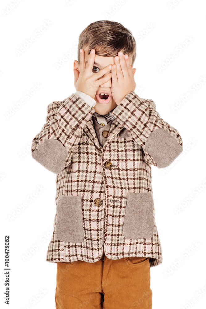 Portrait adorable young happy boy looking at camera isolated on Portrait adorable young happy boy looking at camera isolated on
