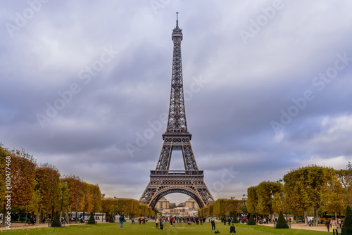 Eiffel tower in Paris with autumn colors and wide angle central perspective. © Daddy Cool