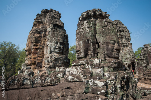 Carved stone heads of Bayon temple, Angkor Wat, Cambodia